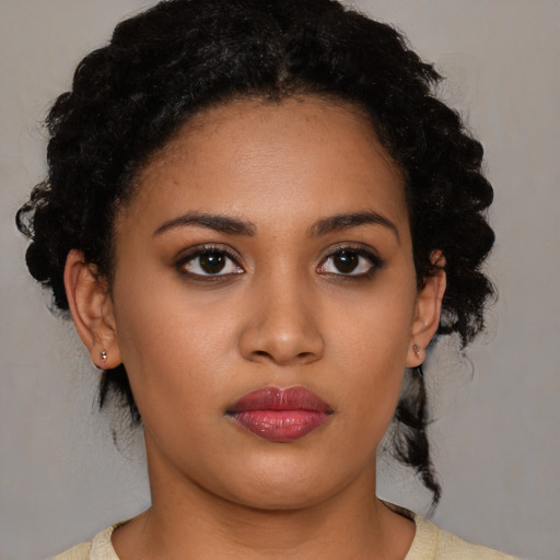 Neutral latino young-adult female with medium  brown hair and brown eyes