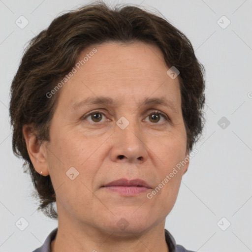 Joyful white adult female with short  brown hair and brown eyes