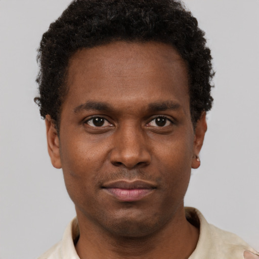 Neutral black young-adult male with short  brown hair and brown eyes