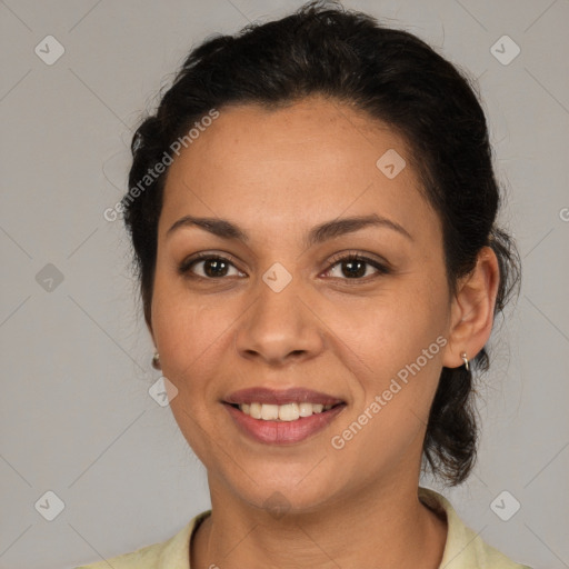 Joyful white adult female with medium  brown hair and brown eyes