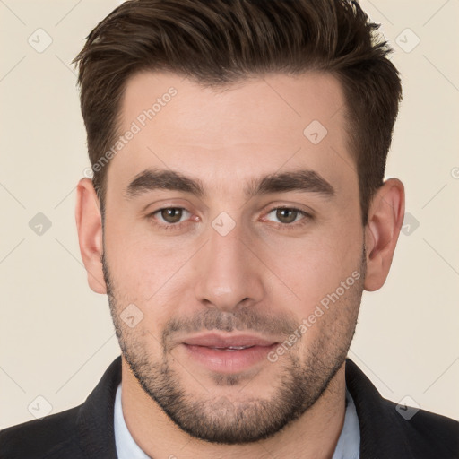 Joyful white young-adult male with short  brown hair and brown eyes