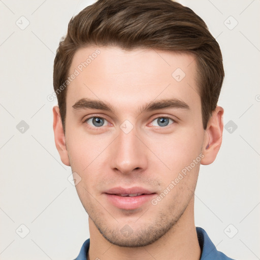 Neutral white young-adult male with short  brown hair and grey eyes