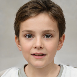 Joyful white child female with short  brown hair and brown eyes