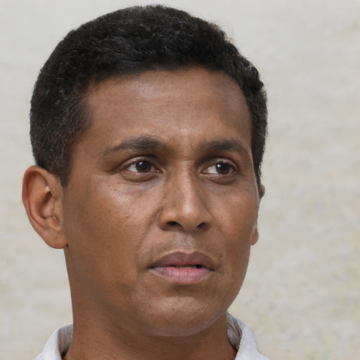 Neutral black young-adult male with short  brown hair and brown eyes