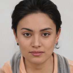 Neutral asian young-adult female with medium  brown hair and brown eyes