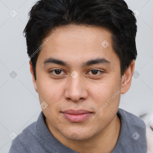 Joyful latino young-adult male with short  brown hair and brown eyes