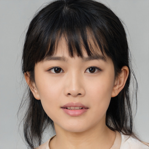 Neutral asian child female with medium  brown hair and brown eyes
