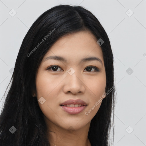 Joyful asian young-adult female with long  black hair and brown eyes