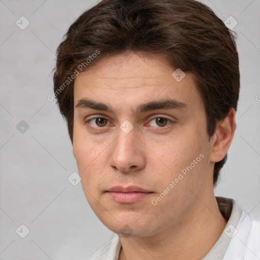 Neutral white young-adult male with short  brown hair and brown eyes