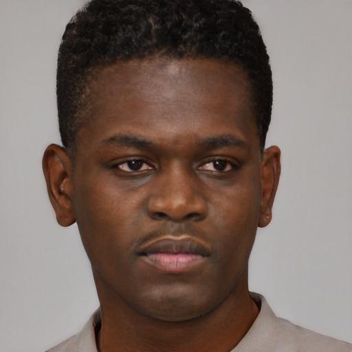 Neutral black young-adult male with short  brown hair and brown eyes
