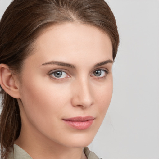 Neutral white young-adult female with medium  brown hair and grey eyes