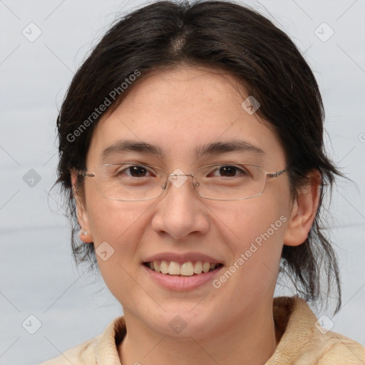 Joyful white adult female with medium  brown hair and brown eyes