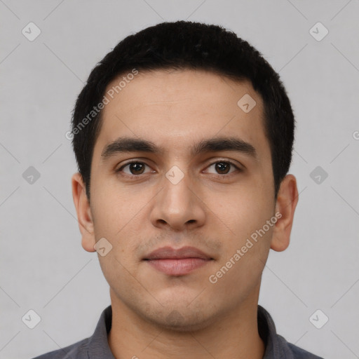 Neutral latino young-adult male with short  black hair and brown eyes