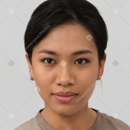 Joyful asian young-adult female with short  brown hair and brown eyes