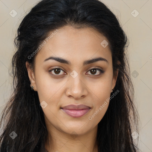 Joyful latino young-adult female with long  brown hair and brown eyes