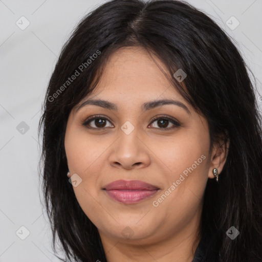 Joyful latino young-adult female with long  brown hair and brown eyes