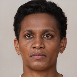 Neutral black young-adult female with short  brown hair and brown eyes