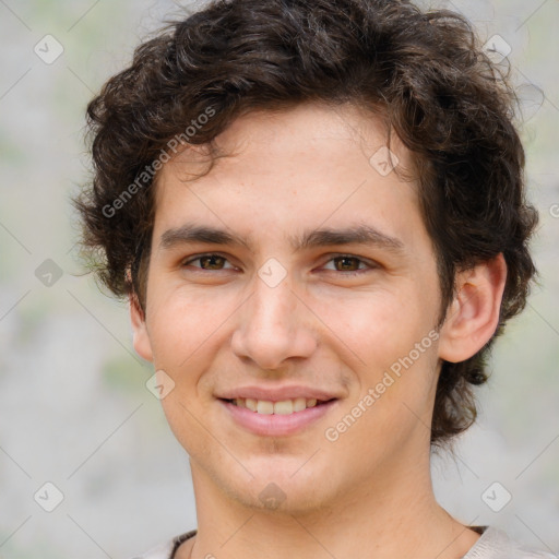 Joyful white young-adult male with medium  brown hair and brown eyes