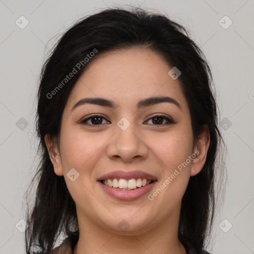 Joyful latino young-adult female with medium  brown hair and brown eyes