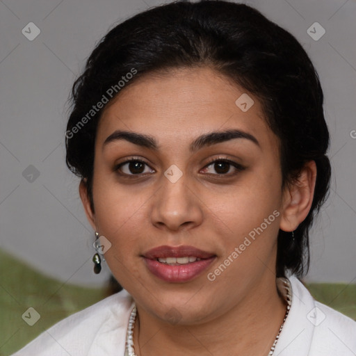 Joyful latino young-adult female with medium  brown hair and brown eyes