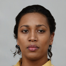 Neutral black young-adult female with short  black hair and brown eyes