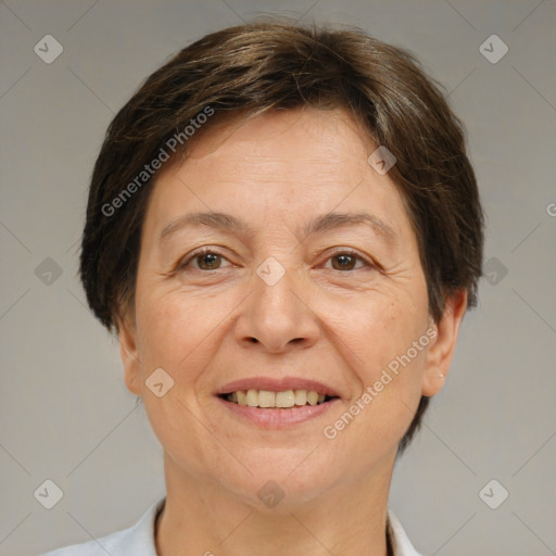 Joyful white adult female with short  brown hair and brown eyes