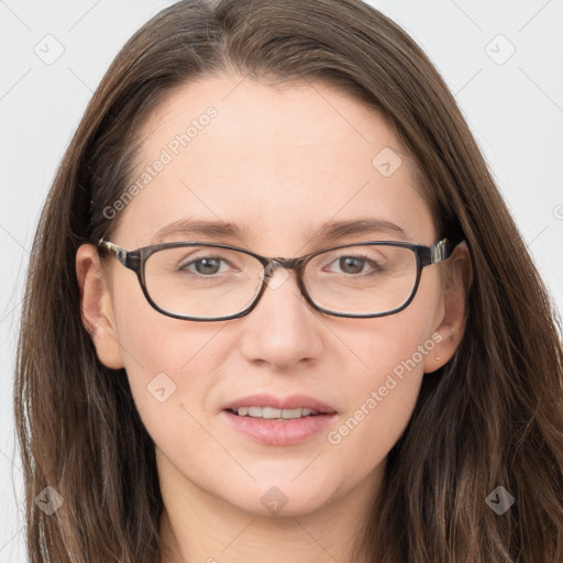 Joyful white young-adult female with long  brown hair and grey eyes