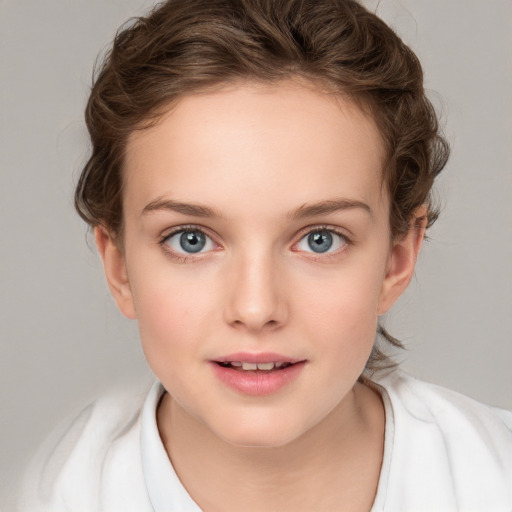 Joyful white child female with medium  brown hair and blue eyes