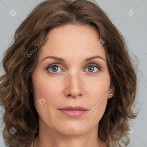 Joyful white young-adult female with medium  brown hair and green eyes