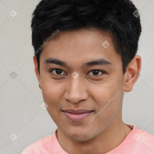 Joyful asian young-adult male with short  black hair and brown eyes