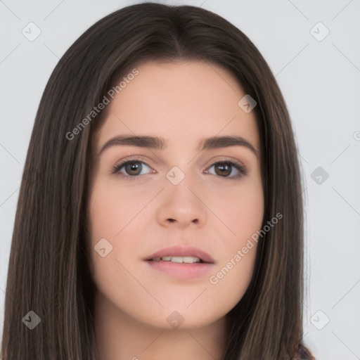 Neutral white young-adult female with long  brown hair and brown eyes