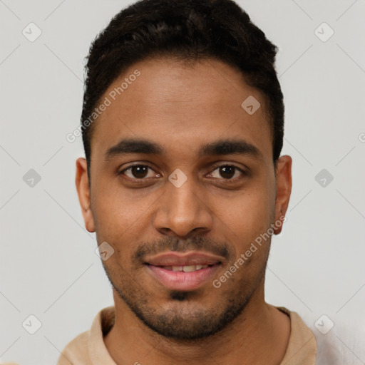 Joyful latino young-adult male with short  brown hair and brown eyes
