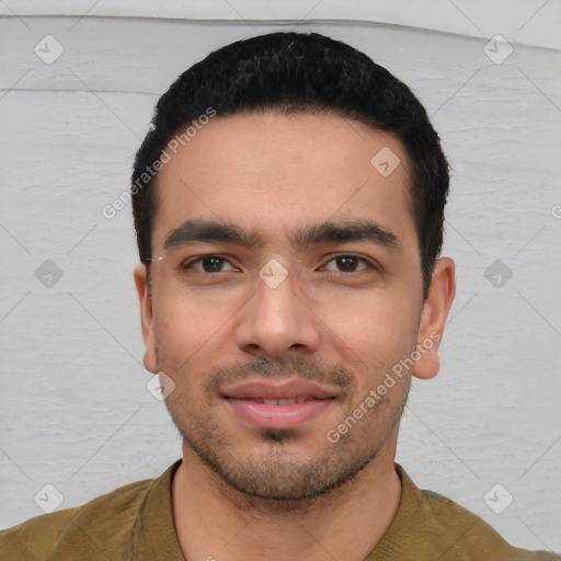 Joyful white young-adult male with short  black hair and brown eyes