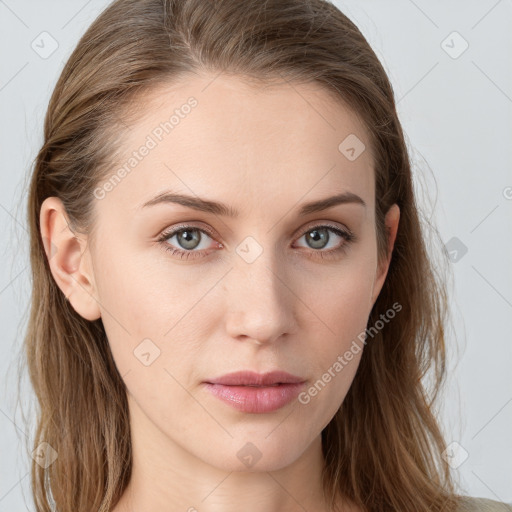 Neutral white young-adult female with long  brown hair and blue eyes