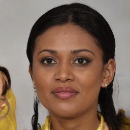 Joyful black young-adult female with medium  brown hair and brown eyes