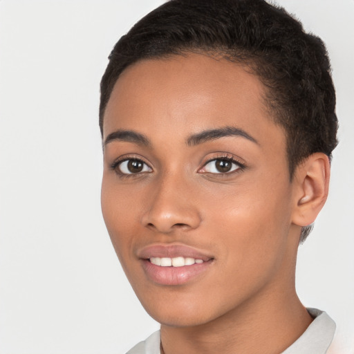 Joyful latino young-adult female with short  brown hair and brown eyes