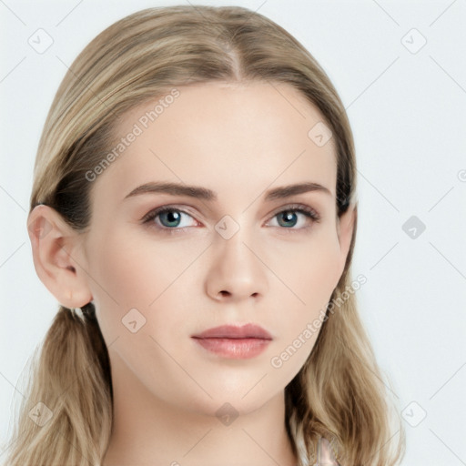 Neutral white young-adult female with long  brown hair and blue eyes