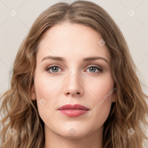 Joyful white young-adult female with long  brown hair and green eyes