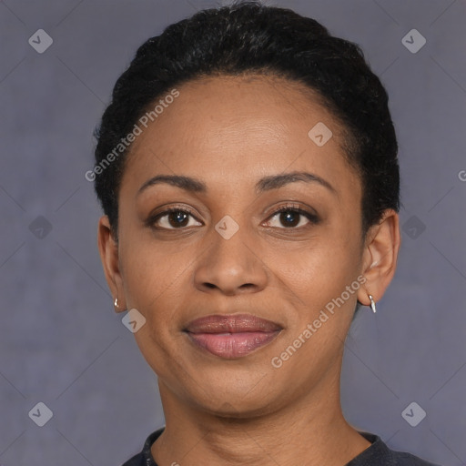 Joyful latino young-adult female with short  black hair and brown eyes