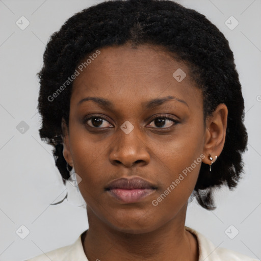 Neutral black young-adult female with short  brown hair and brown eyes