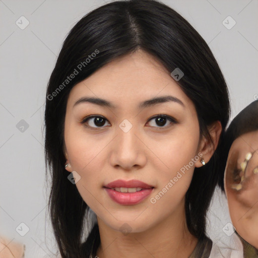 Joyful white young-adult female with medium  black hair and brown eyes