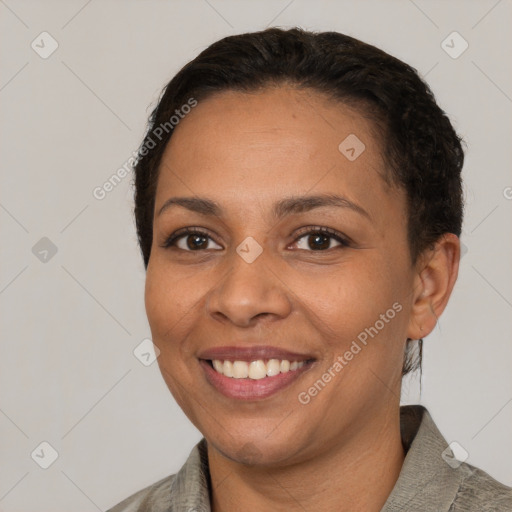 Joyful white young-adult female with short  brown hair and brown eyes