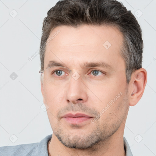 Neutral white adult male with short  brown hair and brown eyes