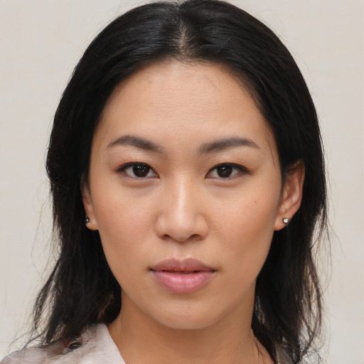 Neutral asian young-adult female with medium  brown hair and brown eyes