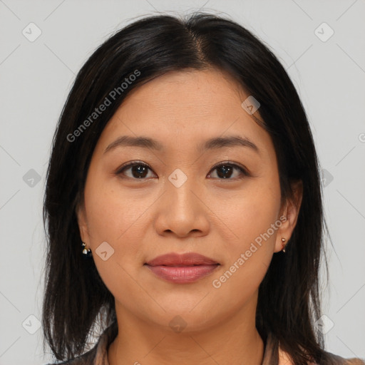 Joyful asian young-adult female with medium  brown hair and brown eyes