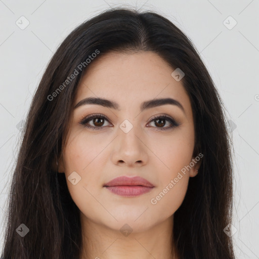 Joyful asian young-adult female with long  brown hair and brown eyes