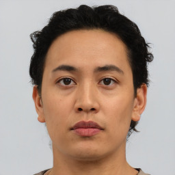 Neutral asian young-adult male with short  brown hair and brown eyes