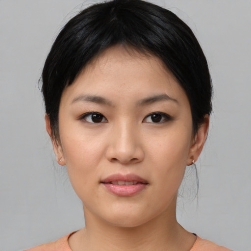 Neutral asian young-adult female with medium  black hair and brown eyes