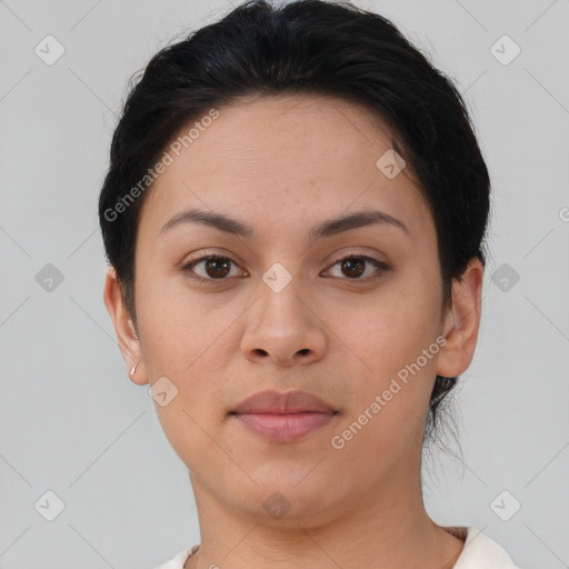 Neutral white young-adult female with short  brown hair and brown eyes