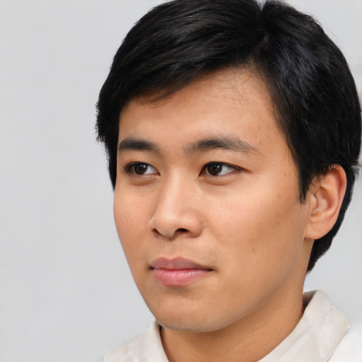 Neutral asian young-adult male with short  black hair and brown eyes